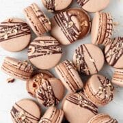 close up of chocolate hazelnut macarons with nutella buttercream