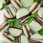 close up of mint chocolate macarons