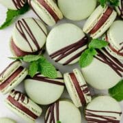 close up of mint chocolate macarons