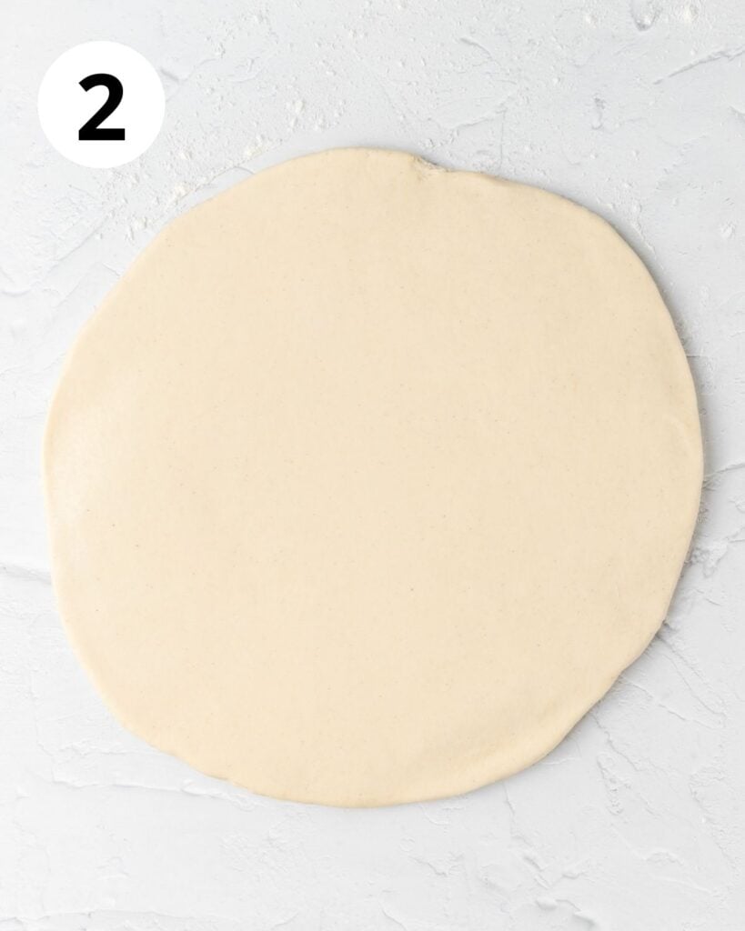 donut dough rolled into large circle