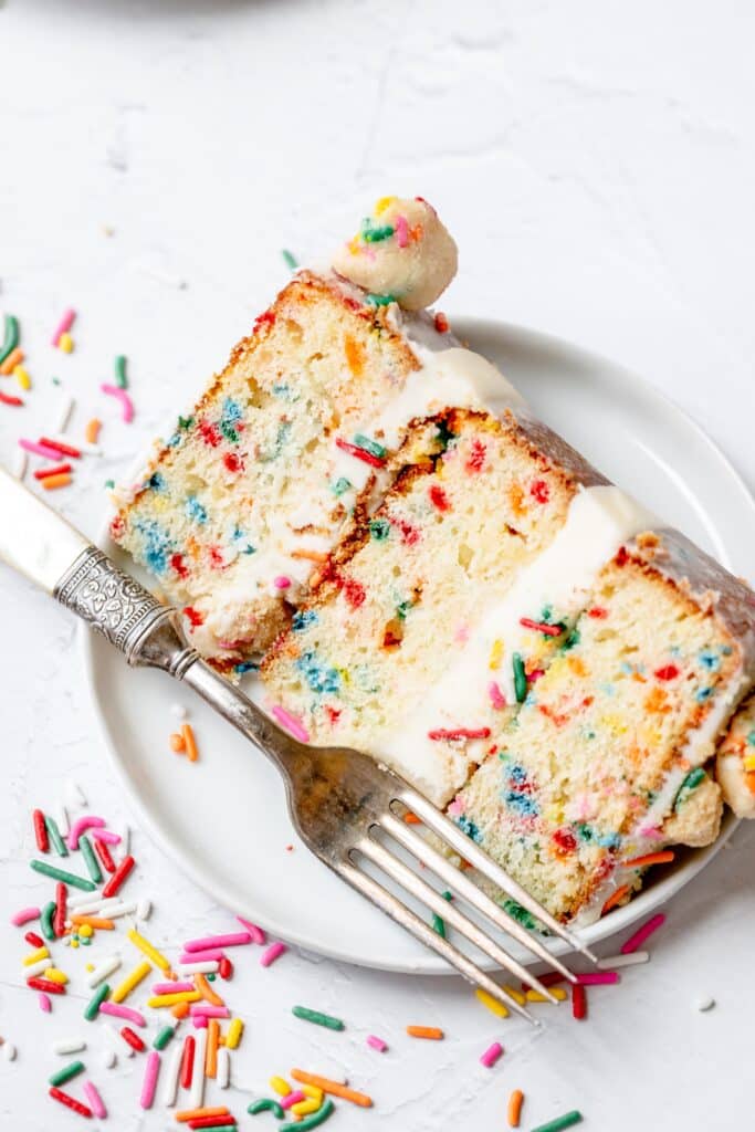 slice of funfetti birthday cake. milk bar copycat
