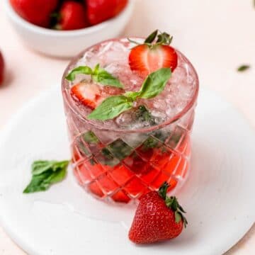close up of strawberry basil mojitos.