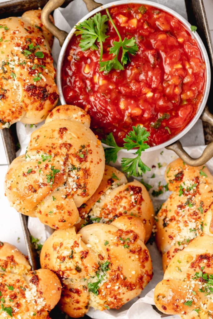 sourdough garlic knots with tomato sauce