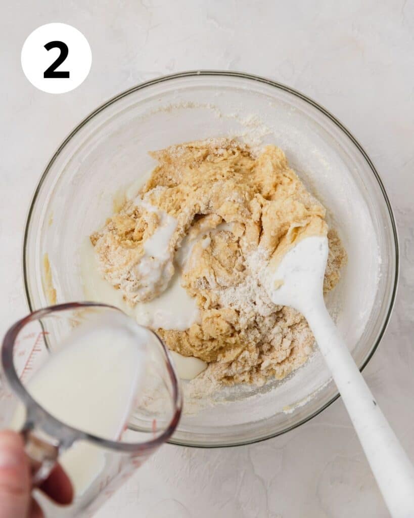 adding milk to flour mixture