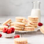 lemon raspberry sandwich cookies with fresh raspberries