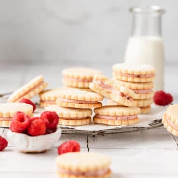 lemon raspberry sandwich cookies with fresh raspberries