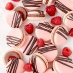 close up of chocolate raspberry macarons