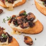 close up of mushroom brie crostini