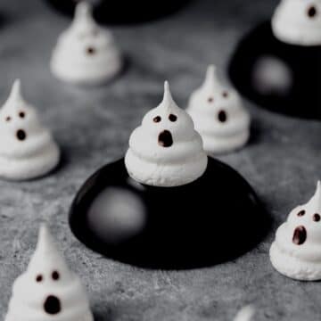 super close up of ghost meringue cookies