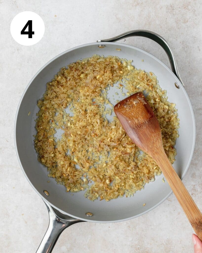 adding rice to pan