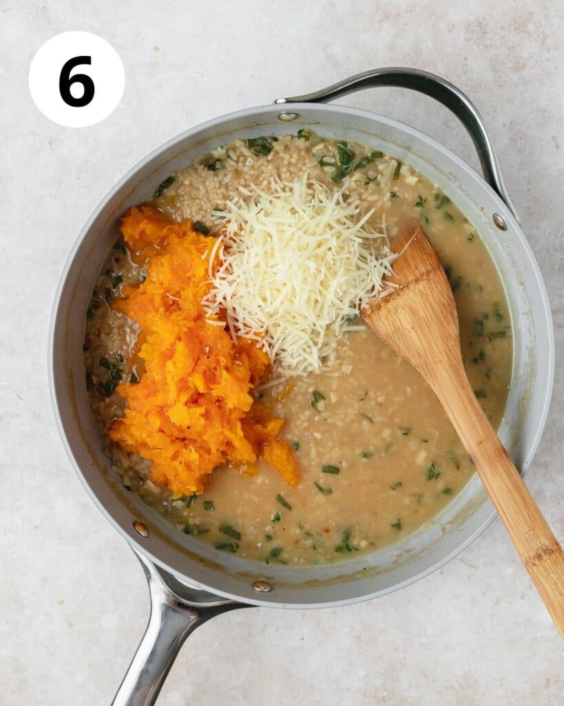 adding roasted squash and cheese to risotto