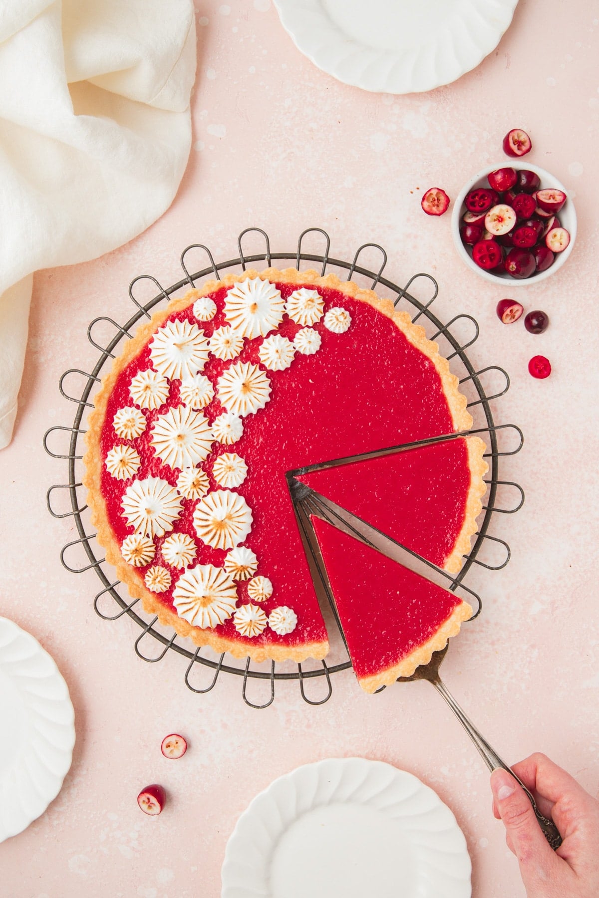 sliced cut out of cranberry curd tart