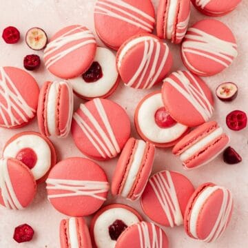 close up of white chocolate cranberry macarons