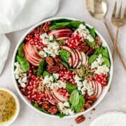 close up of spinach pomegranate salad
