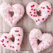 close up of heart shaped donuts.