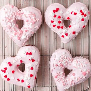 close up of heart shaped donuts.