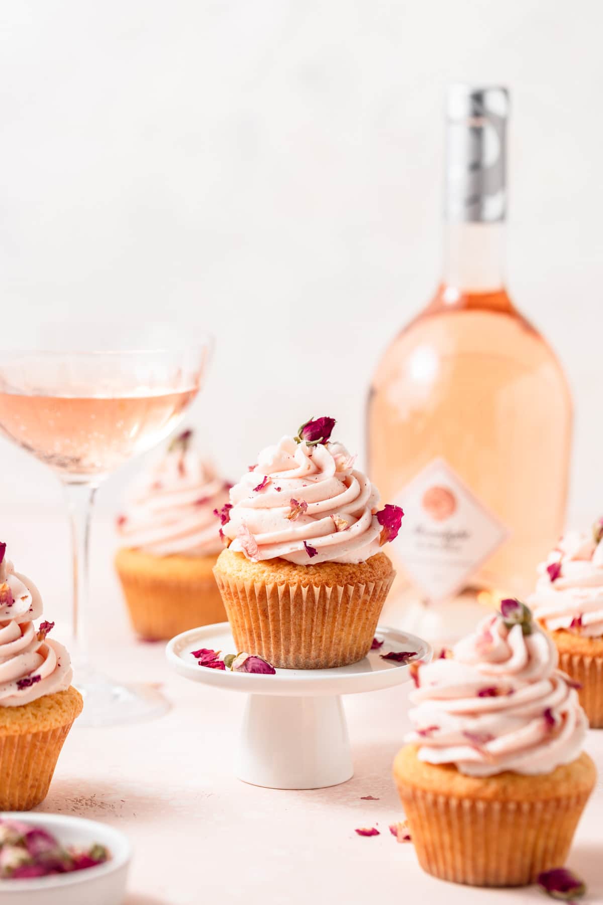 rosé wine cupcakes with rose petals on top