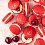 close up of cherry cheesecake macarons.