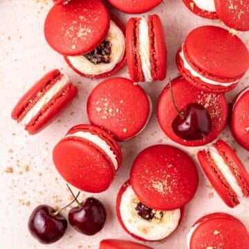 close up of cherry cheesecake macarons.