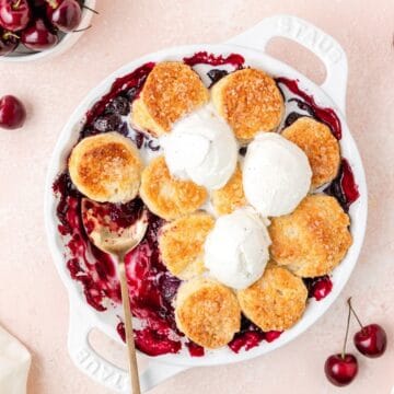 close up of cherry cobbler with biscuit topping