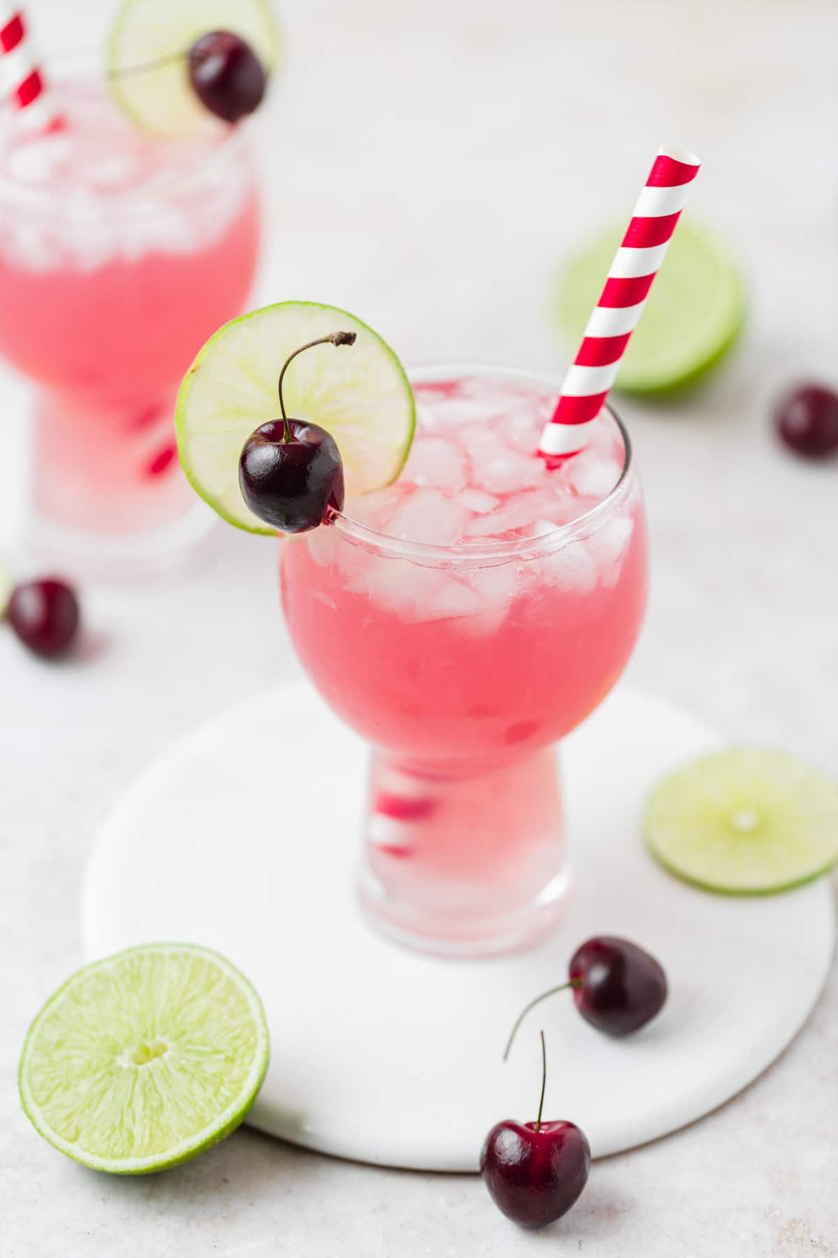 boozy cherry limeade with fresh cherries.