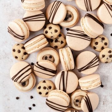 close up of chocolate chip cookie dough macarons.