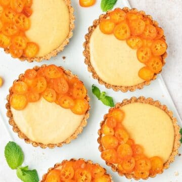 close up of candied kumquat custard tarts.