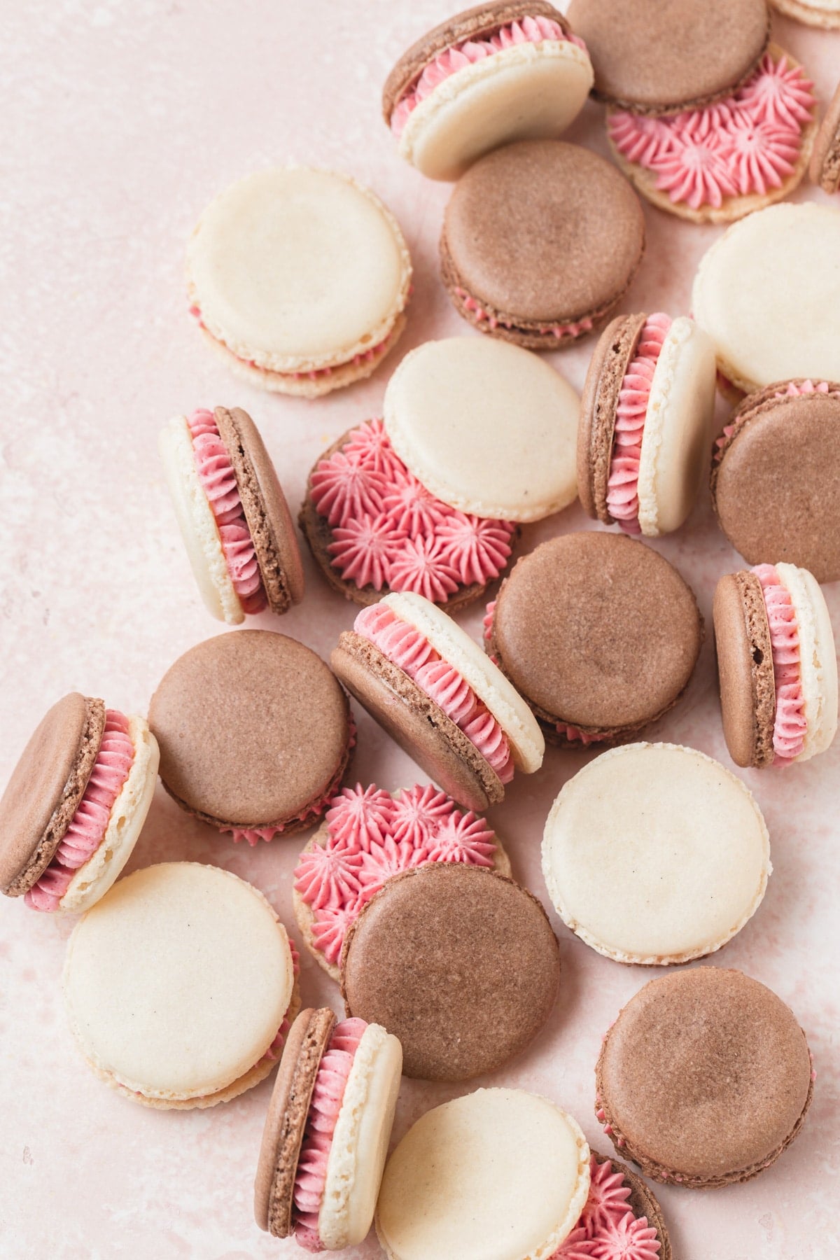 neapolitan macarons with strawberry buttercream.