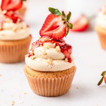 close up of peanut butter and jelly cupcakes with strawberry jam.