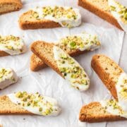 close up of pistachio white chocolate biscotti.