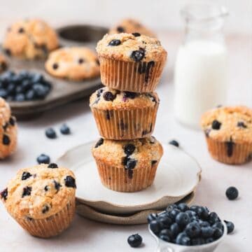 close up of stack of sourdough blueberry muffins.