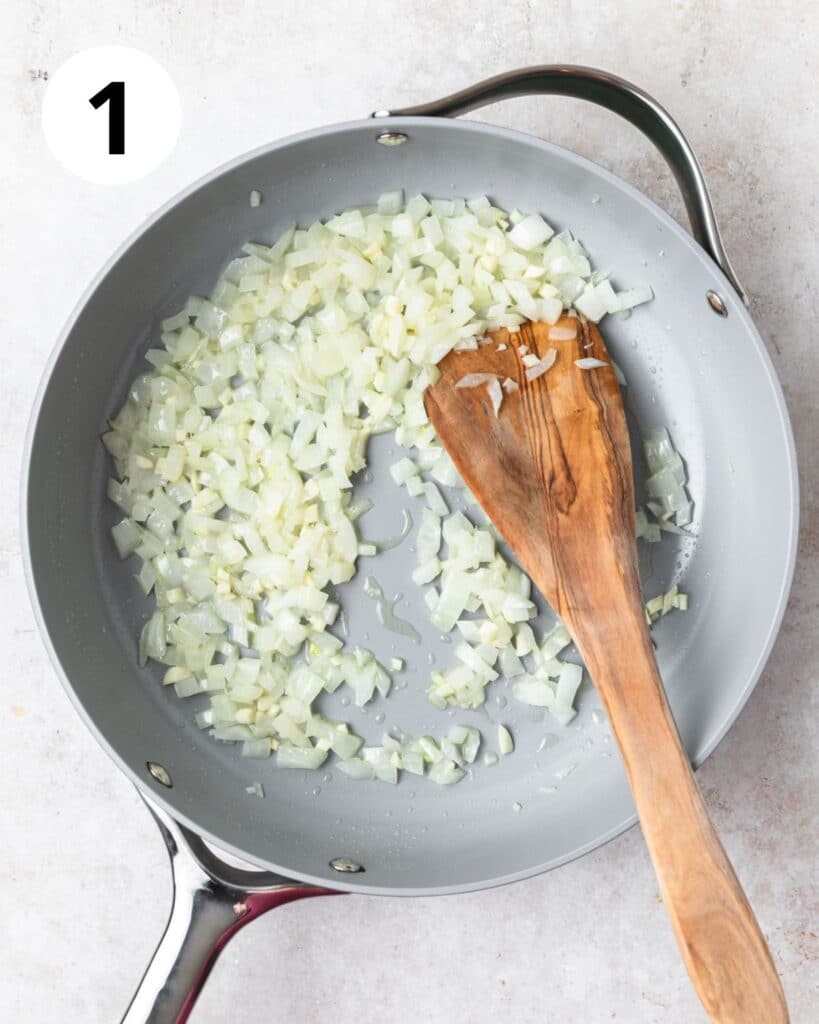 sautéing onion and garlic in pan.