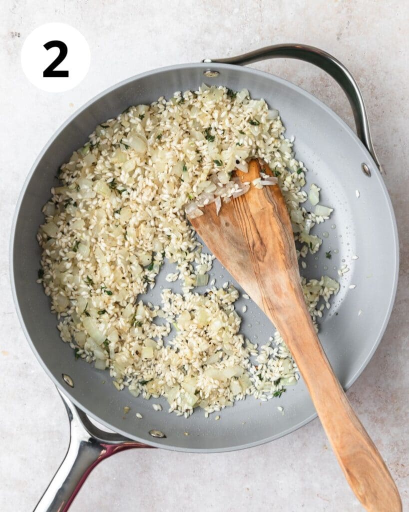 toasting arborio rice in pan.