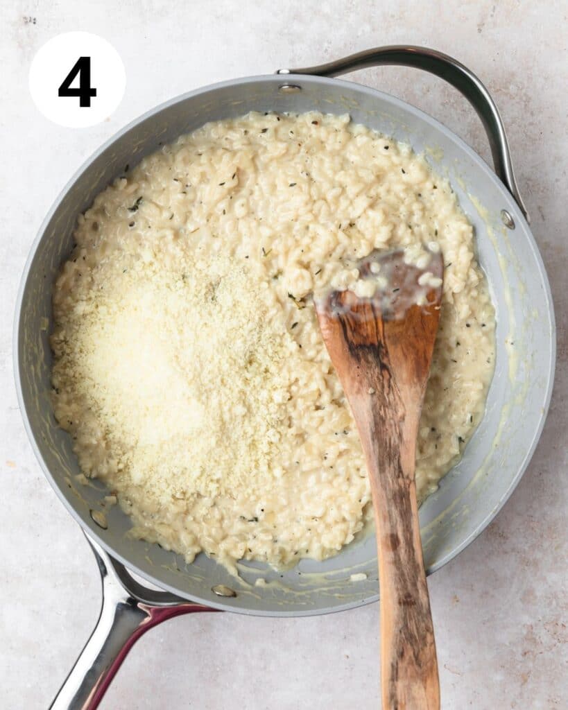 adding in parmesan cheese to risotto.