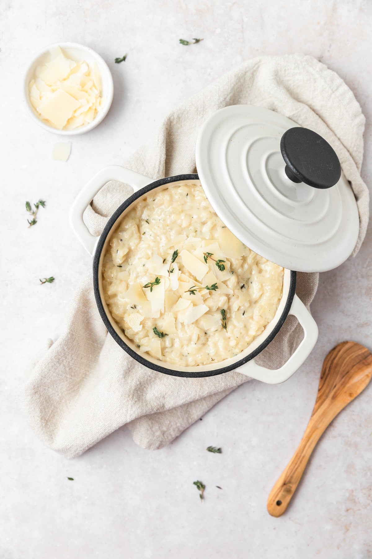 pot of simple parmesan risotto with thyme.