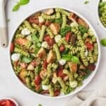 close up of chicken pesto pasta salad.