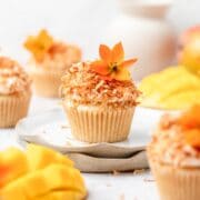 close up of mango coconut cupcakes.