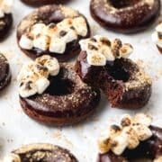 close up of baked s'mores donuts.