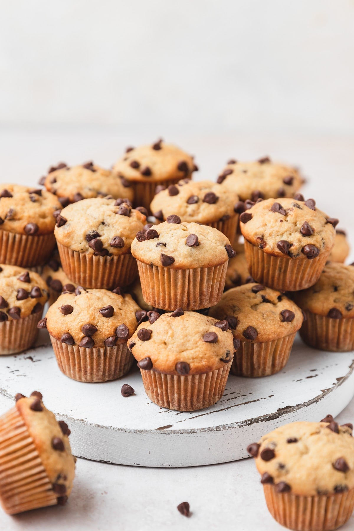 stack of mini banana chocolate chip muffins. 