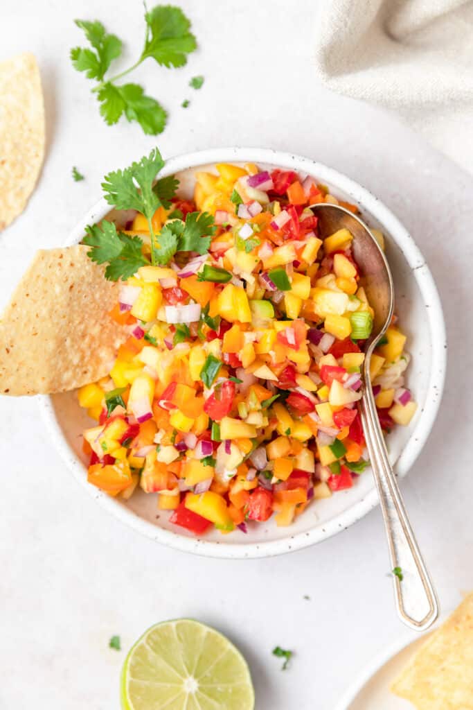 peach mango salsa in bowl.
