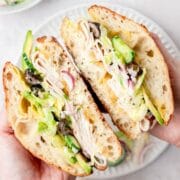 closeup of turkey avocado grinder sandwich.
