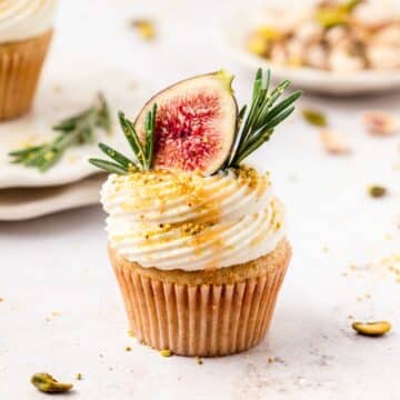 close up of fig olive oil cupcakes with mascarpone frosting.