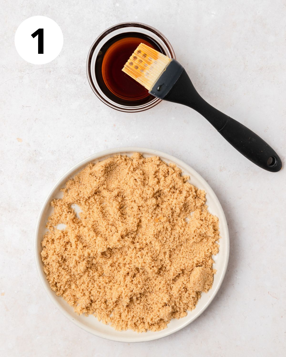 bowl of maple syrup and plate of brown sugar.