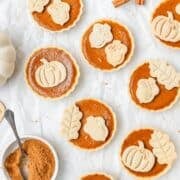 close up of mini pumpkin pie tarts.