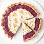 close up of purple sweet potato pie with toasted meringue.