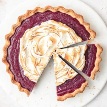 close up of purple sweet potato pie with toasted meringue.