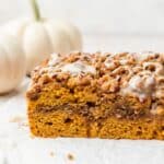 close up of pumpkin coffee cake with pecan streusel.