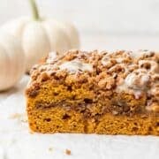 close up of pumpkin coffee cake with pecan streusel.