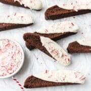 close up of chocolate peppermint biscotti dipped in white chocolate.