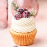 close up of cranberry cupcakes with white chocolate buttercream.